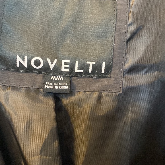 New with out tags Women’s size M Black long puffer jacket - Picture 4 of 4